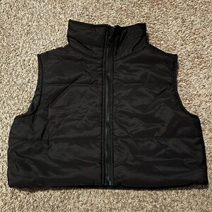 Cropped puffer with no sleeves. I purchased this from Shein, Size M, color black